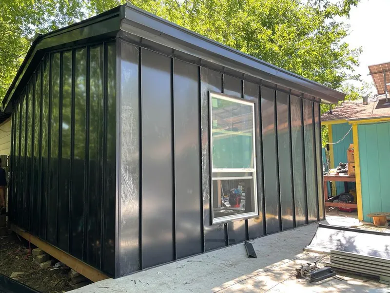 Black standing seam metal wall panels for Metal Roof Installation in Malden